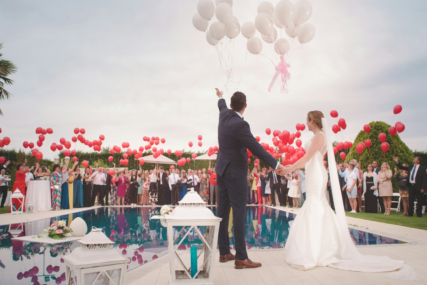 Wedding guests celebrating with the couple